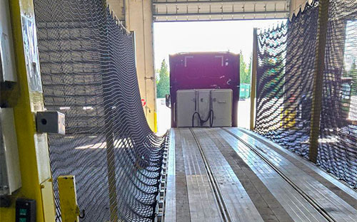 Flatbed Truck with Fall Protection Netting System