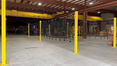 Truck netting fall protection set up for loading and unloading flatbeds.